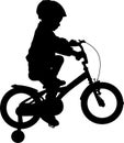 Toddler boy riding bicycle high quality silhouette