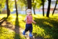 Toddler boy running in the park Royalty Free Stock Photo