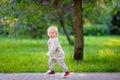 Toddler boy running in the park Royalty Free Stock Photo