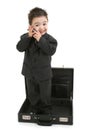 Toddler Boy in Suit Standing in Briefcase Royalty Free Stock Photo