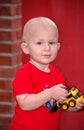 Toddler boy and toy truck Royalty Free Stock Photo