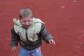 Toddler child crying outside in playground