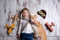 Toddler child and dog, boy and puppy playing together at home Royalty Free Stock Photo