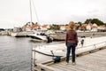 Toddler child, enjoying the view over beautiful small village in south Norway Royalty Free Stock Photo