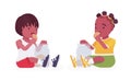 Toddler children, black little boy and girl enjoying eating cookies Royalty Free Stock Photo