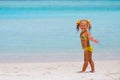 Toddler cute girl standing on tropical beach Royalty Free Stock Photo