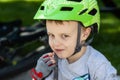 Toddler Dressed in Bicycle Safety Gear with Helmet & Gloves