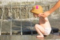 Toddler drinking from the water fountain Royalty Free Stock Photo