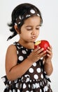 Toddler eating apple Royalty Free Stock Photo