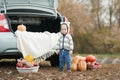 toddler enjoying harvest festival celebration at pumpkin patch. Kids picking and carving pumpkins at country farm on Royalty Free Stock Photo