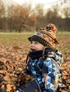 Toddler enjoying the park in Autumn