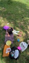 A toddler enjoying picnic in a park