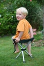 Toddler on a folding chair