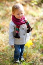 Toddler girl at autumn park Royalty Free Stock Photo