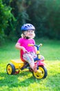 Toddler girl on a bike Royalty Free Stock Photo