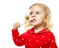 Toddler girl brushing her teeth Royalty Free Stock Photo