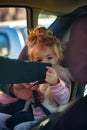 Toddler girl buckled into her car seat Royalty Free Stock Photo