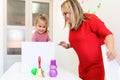 Toddler girl in child occupational therapy session doing sensory playful exercises with her therapist. Royalty Free Stock Photo