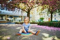 Toddler girl drawing rainbow with colorful chalks Royalty Free Stock Photo