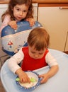 Toddler Girl Eating Cereal