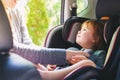 Toddler girl in her car seat Royalty Free Stock Photo