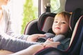 Toddler girl in her car seat Royalty Free Stock Photo