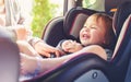 Toddler girl in her car seat Royalty Free Stock Photo