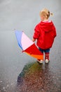 Toddler girl outdoors at rainy day Royalty Free Stock Photo