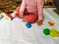 Toddler girl sculpt with plasticine at home