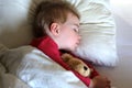 Toddler girl sleeping in bed Royalty Free Stock Photo
