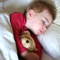 Toddler girl sleeping in bed Royalty Free Stock Photo