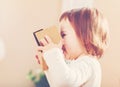 Toddler girl using a virtual reality headset Royalty Free Stock Photo