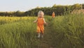 Toddler girl walking outdoor with mother family vacations Royalty Free Stock Photo