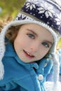 Toddler girl winter hat portrait outdoors