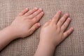 Toddler hand with canvas background