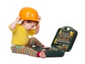 Toddler in hardhat with tool box