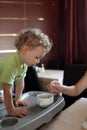 Toddler has breakfast Royalty Free Stock Photo