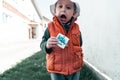 Toddler holding cookies with the words `Stop War` Royalty Free Stock Photo