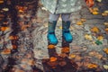 Toddler jumping in pool of water at the autumn day Royalty Free Stock Photo