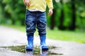 Toddler jumping in pool of water Royalty Free Stock Photo