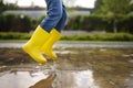 Toddler jumping in pool of water at the summer or autumn day Royalty Free Stock Photo