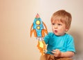 Toddler play astronaut and rocket liftoff