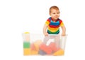 Toddler play in basket with blocks