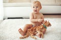 Toddler playing with cat Royalty Free Stock Photo