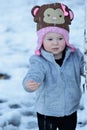 Toddler playing in falling water Royalty Free Stock Photo