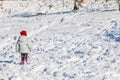 Toddler playing in the snow Royalty Free Stock Photo