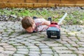 Toddler Playing with a Toy Fire Truck Outside - Series 8 Royalty Free Stock Photo