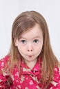 Toddler pulling funny face