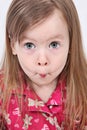 Toddler pulling funny face