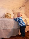Toddler reaching for a Ball Royalty Free Stock Photo